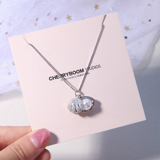 Shell item decorated with pearls - GM Traders