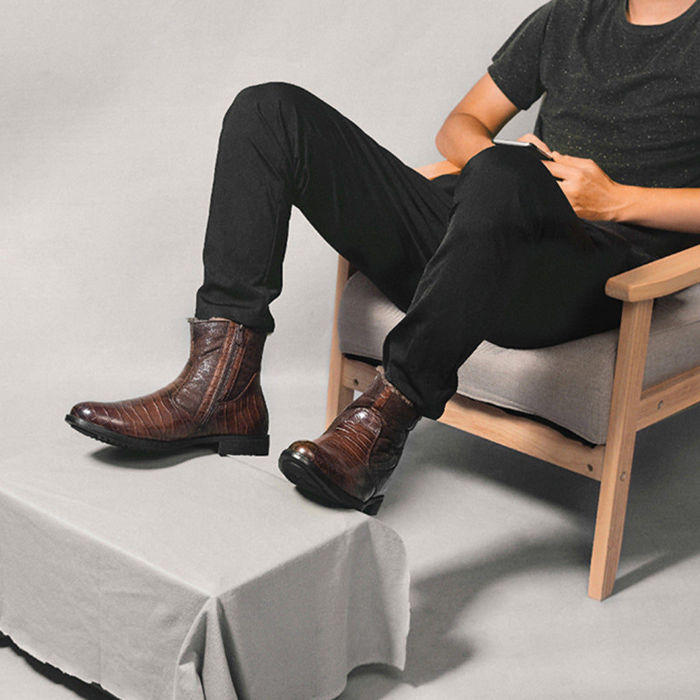 Brown leather winter boots with textured ankle design and stacked heel