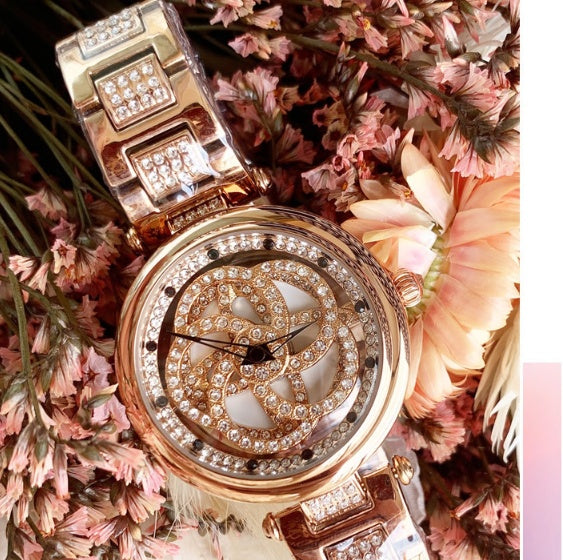 Foreign trade hot style watch female steel watch lady quartz watch to turn the windmill surface douyin the same - GM Traders