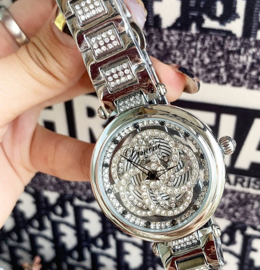Foreign trade hot style watch female steel watch lady quartz watch to turn the windmill surface douyin the same - GM Traders