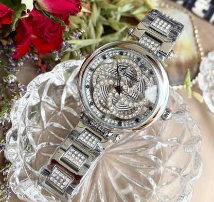 Foreign trade hot style watch female steel watch lady quartz watch to turn the windmill surface douyin the same - GM Traders