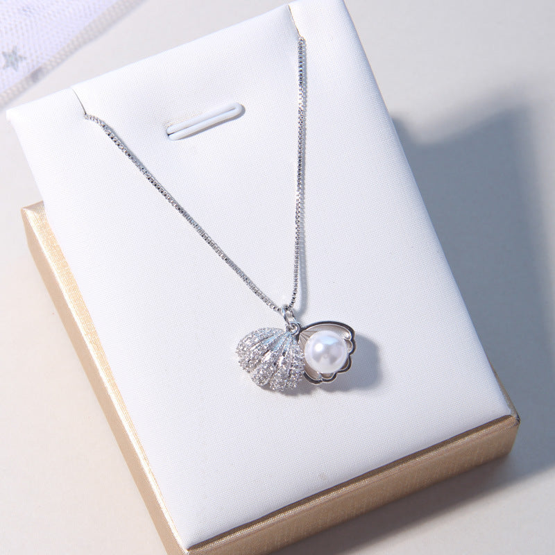 Shell item decorated with pearls - GM Traders