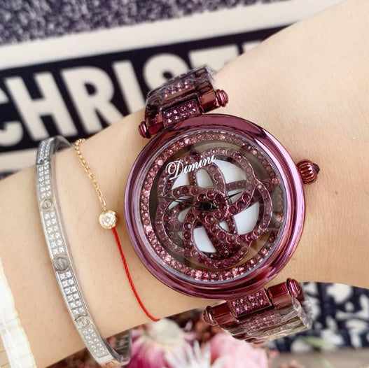 Foreign trade hot style watch female steel watch lady quartz watch to turn the windmill surface douyin the same - GM Traders