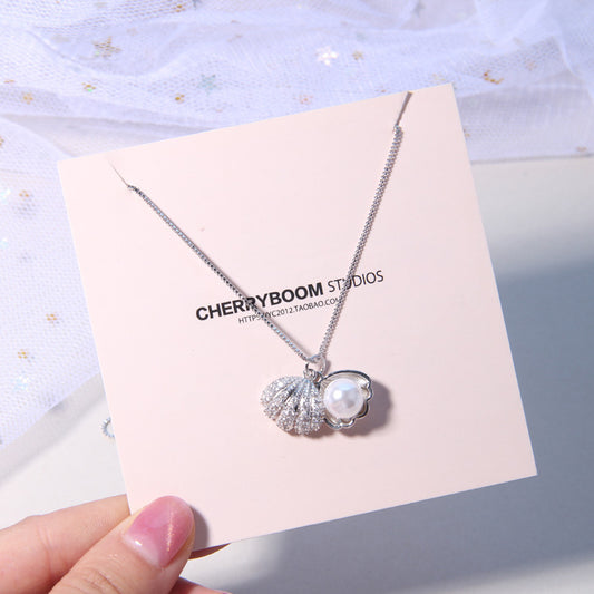 Shell item decorated with pearls - GM Traders