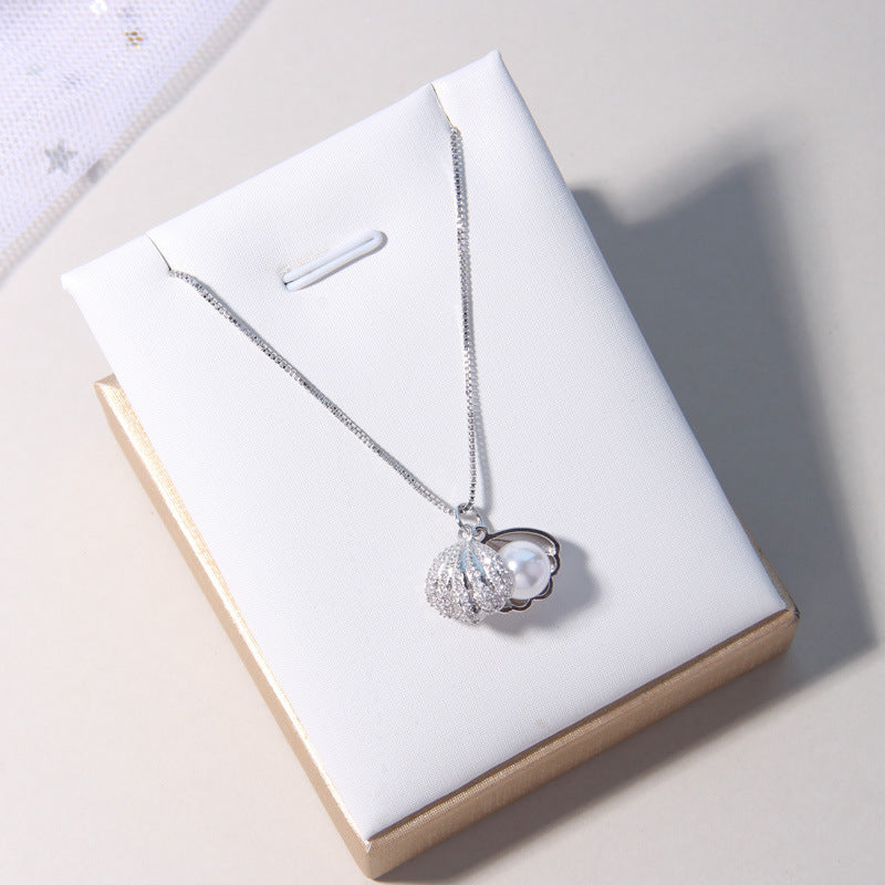 Shell item decorated with pearls - GM Traders