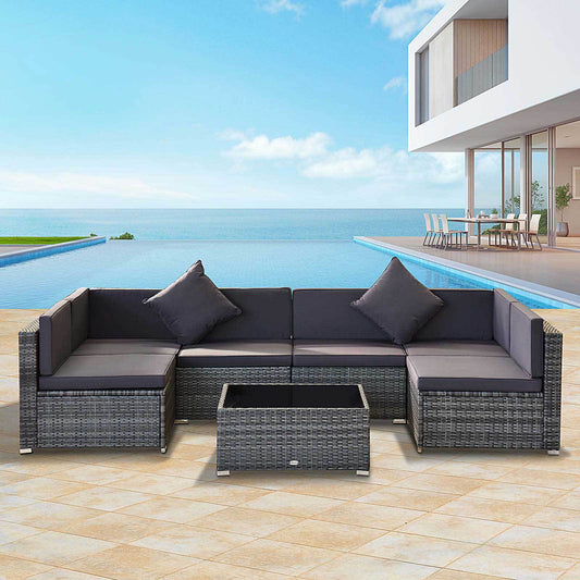 “7-Piece Wicker Patio Set – Outdoor Sectional Sofa with Cushions & Glass Table (Gray)” 🛋️✨ - GM Traders